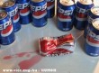 Coca Cola a banda fogságában